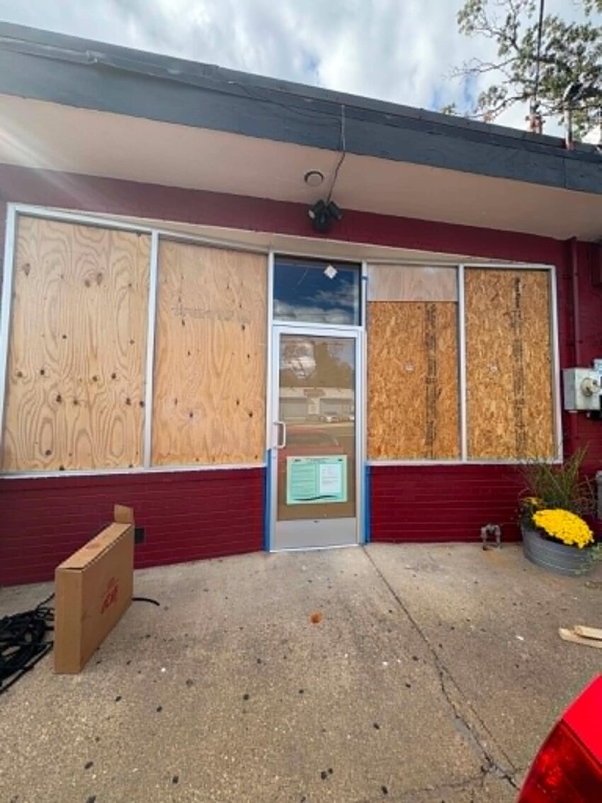 Emergency board-up service for broken storefront glass Washington DC