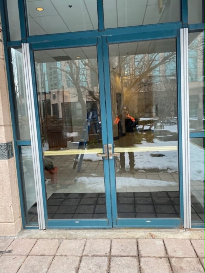 Metropolitan Glass Repair delivery vehicle loaded with glass panels